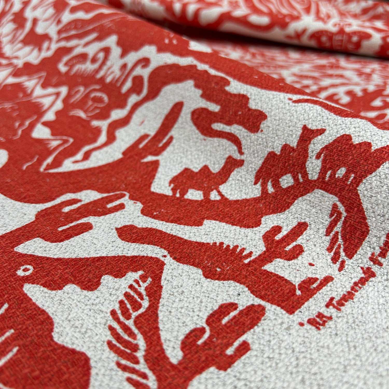 sustainably produced red and cream cotton linen fabric