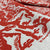 sustainably produced red and cream cotton linen fabric