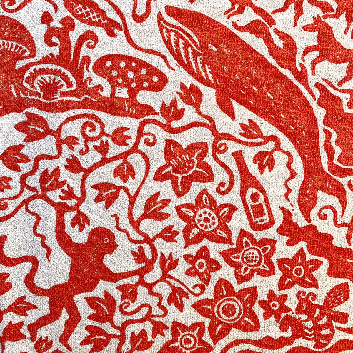 whale and monkey print in range on cream linen cotton