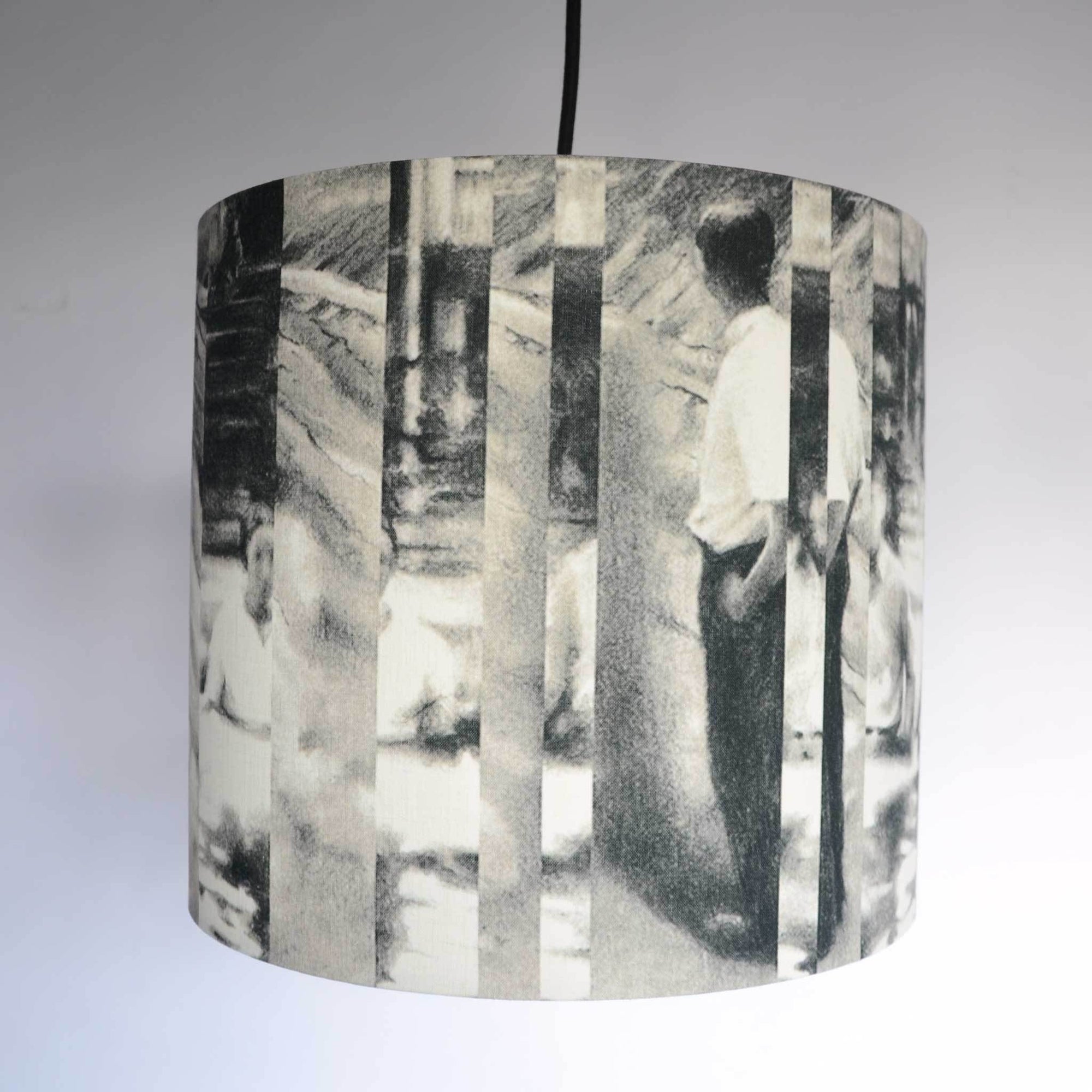 Table lamp with grey fabric lampshade at Wilson Contemporary art Gallery in Harrogate