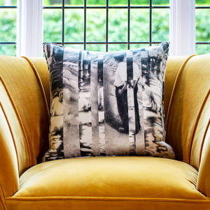 Great abstract linen cushion on mustard velvet sofa