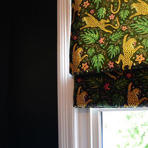 Printed velvet drapes blind on sash windows