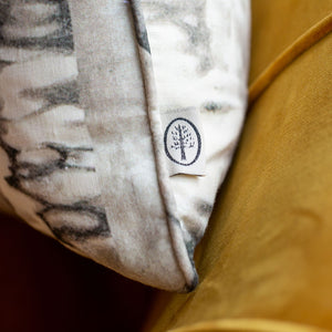 Label Detail - Between Certainty and Oblivion Luxury cushion by the Monkey Puzzle Tree