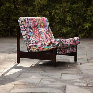 Rita does Jazz velvet by Sarah Thornton for The Monkey Puzzle Tree upholstered onto modern chair outside