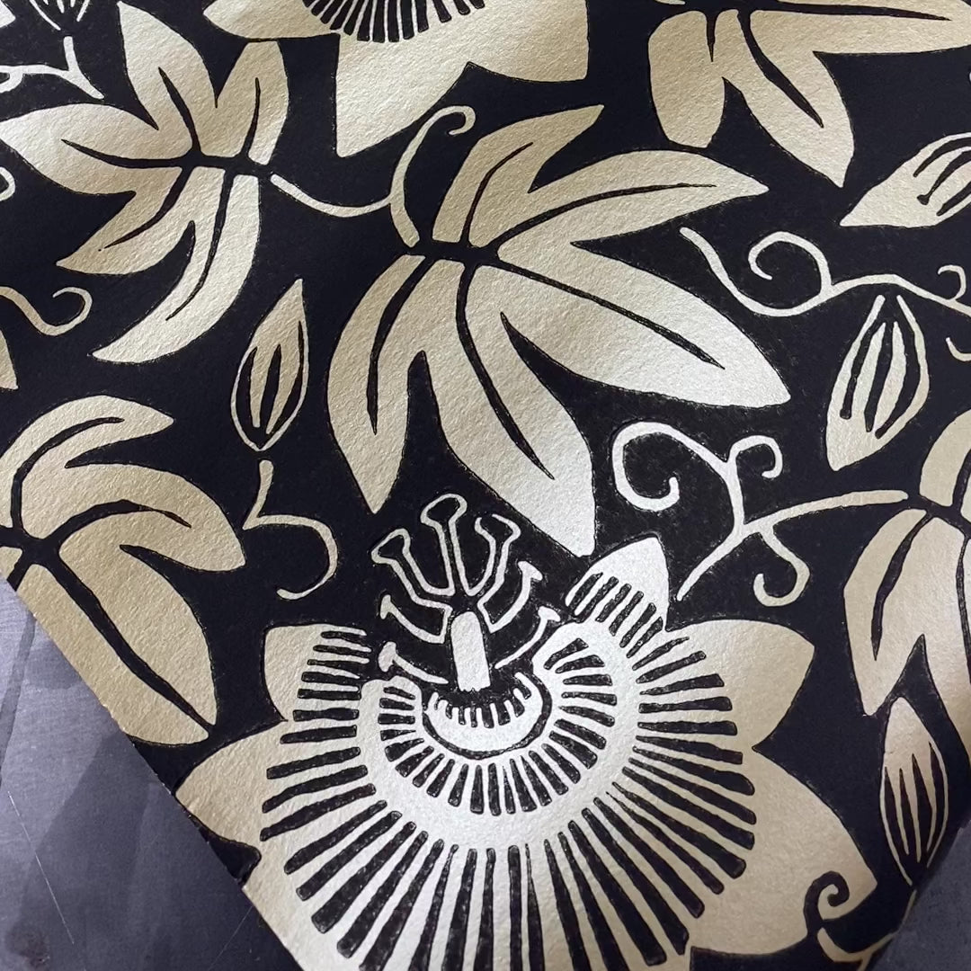 Black and gold botanical wallpaper